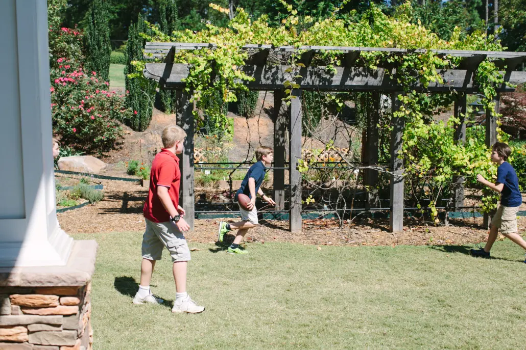 A Montessori nature walk, where children observe plants, insects, and natural surroundings.