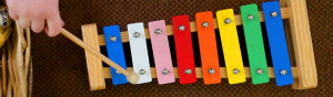 Montessori math materials, such as number rods, being used to learn counting and number sequencing.